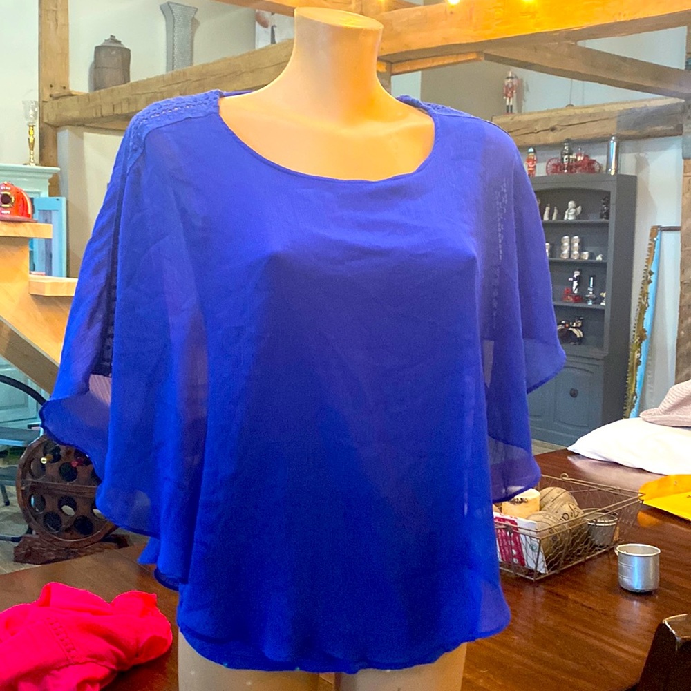 Blue blouse great for spring.   Apt 9